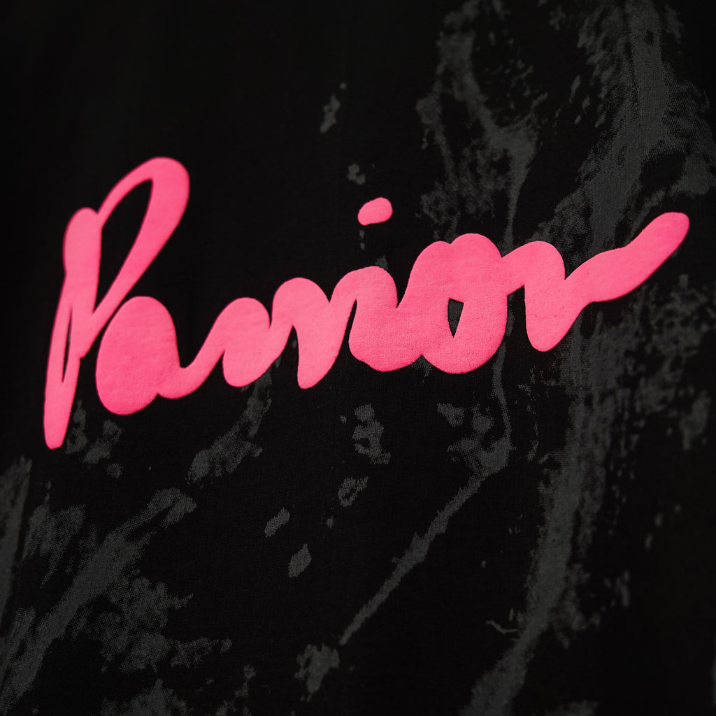 Pink 'Passion' text on a black textured background