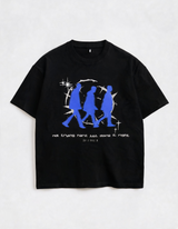 Black t-shirt with blue graphic and text on a light gray background