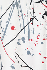 Abstract art with splashes of red, black, and gray on a white background