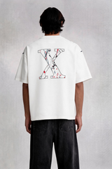 Person wearing a white t-shirt with a design on the back against a plain background