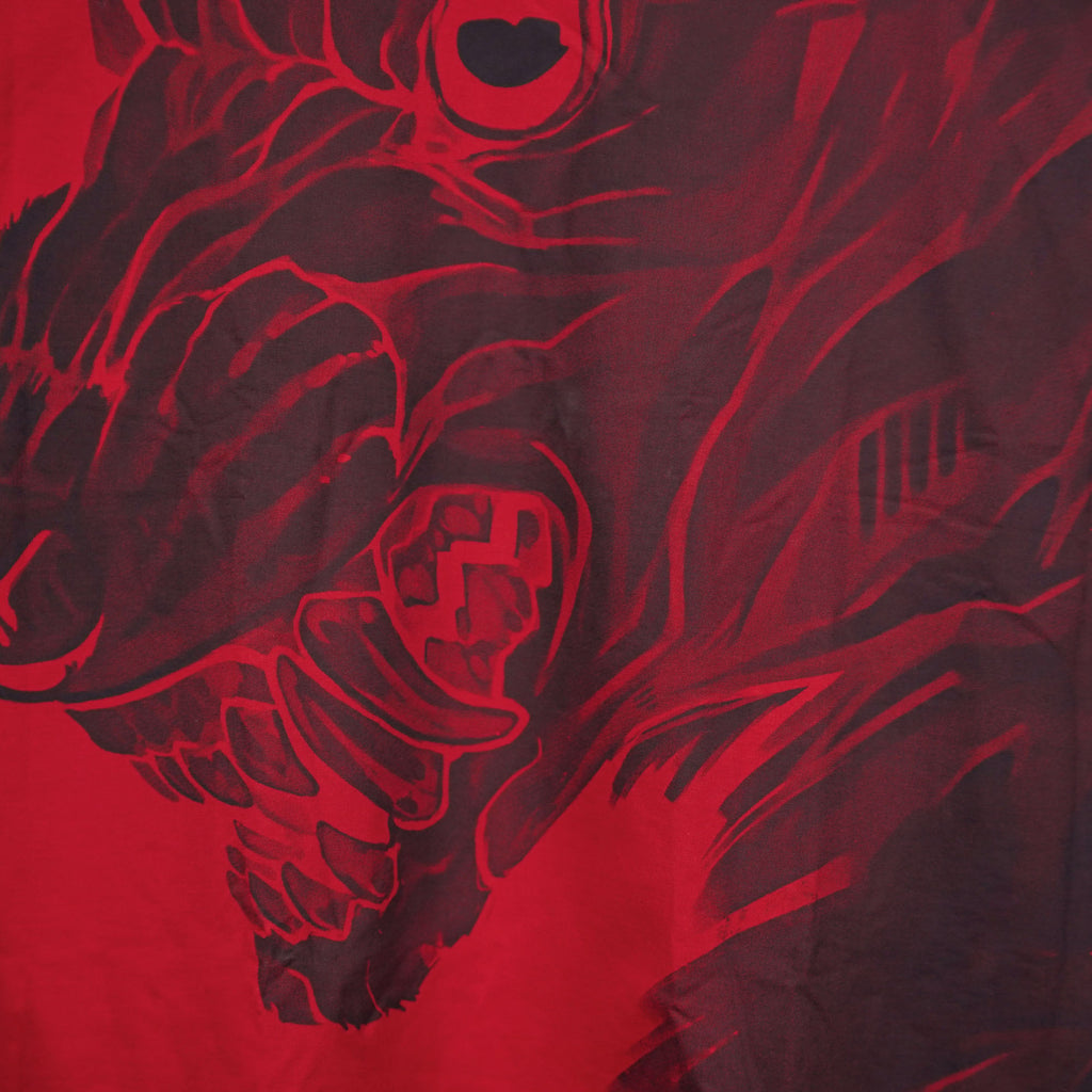 Red and black graphic design of a bear on a red background